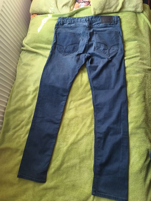 Spodnie jeansowe męskie firmy Joop rozmiar 33/34 nowe