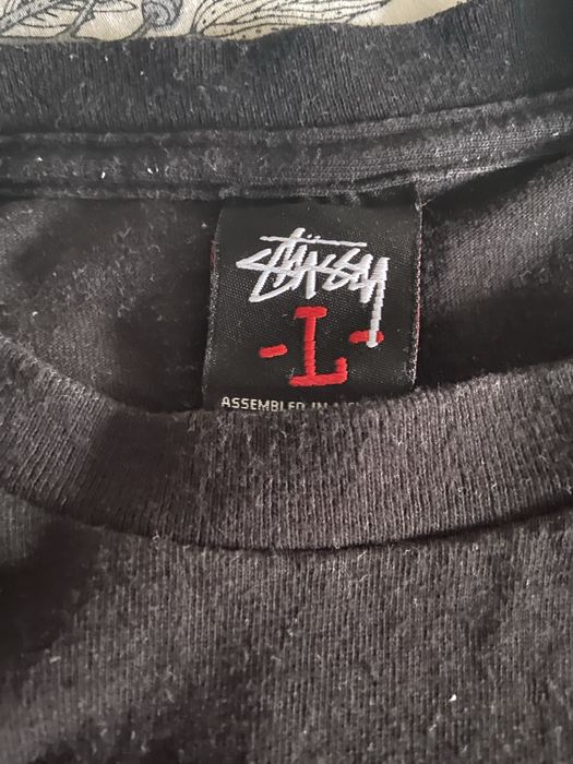 Koszulka kultowej firmy stussy .