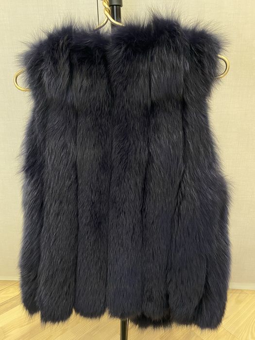 Хутряний жилет з кишенями