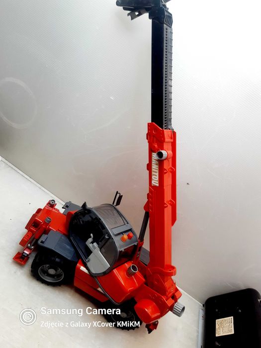 zabawka dźwig ładowarka model Bruder Manitou MRT2150 uszkodzona