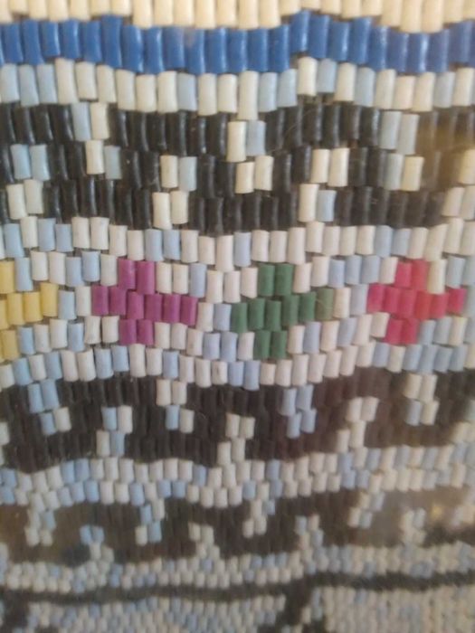 Картина сплетена бiсером.