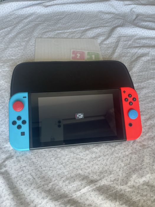 Nintendo Switch Desbloqueada POR CHIP e acessórios