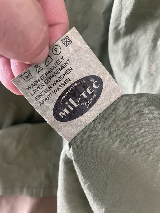 Mil tec kamizelka, bezrękawnik rozpinany z kapturem chowanym. Używana. Rozmiar L