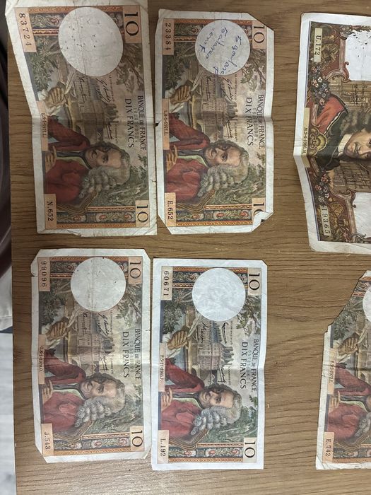 8 notas antigas de 10 e 100 Francs
