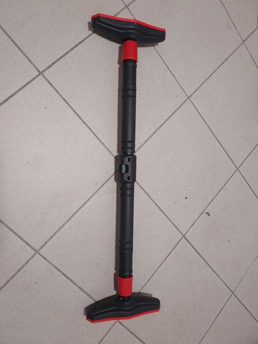 Nowy Drążek rozporowy do ćwiczeń 200 kg  pozwrotowy