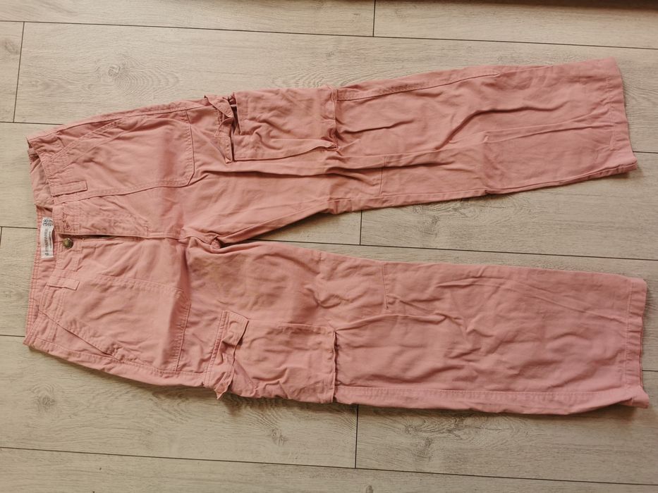 Szerokie spodnie różowe damskie 38 Stradivarius