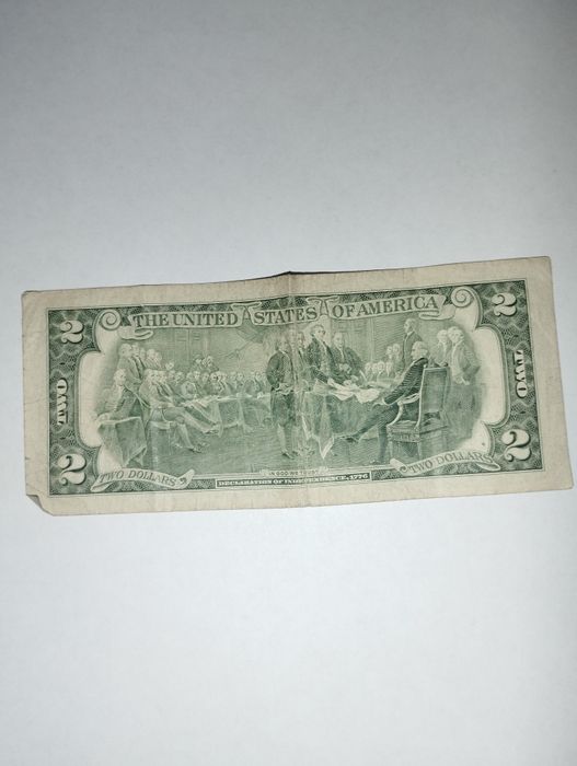 Продам 2 доллара