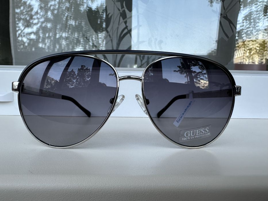 Жіночі та чоловічі сонцезахисні окуляри guess, Tommy Hilfiger, Levi’s