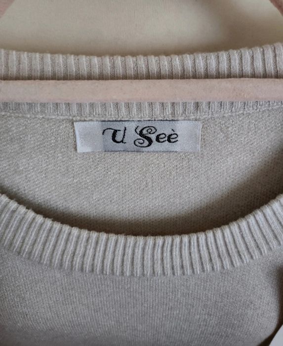 Sweter damski pompony