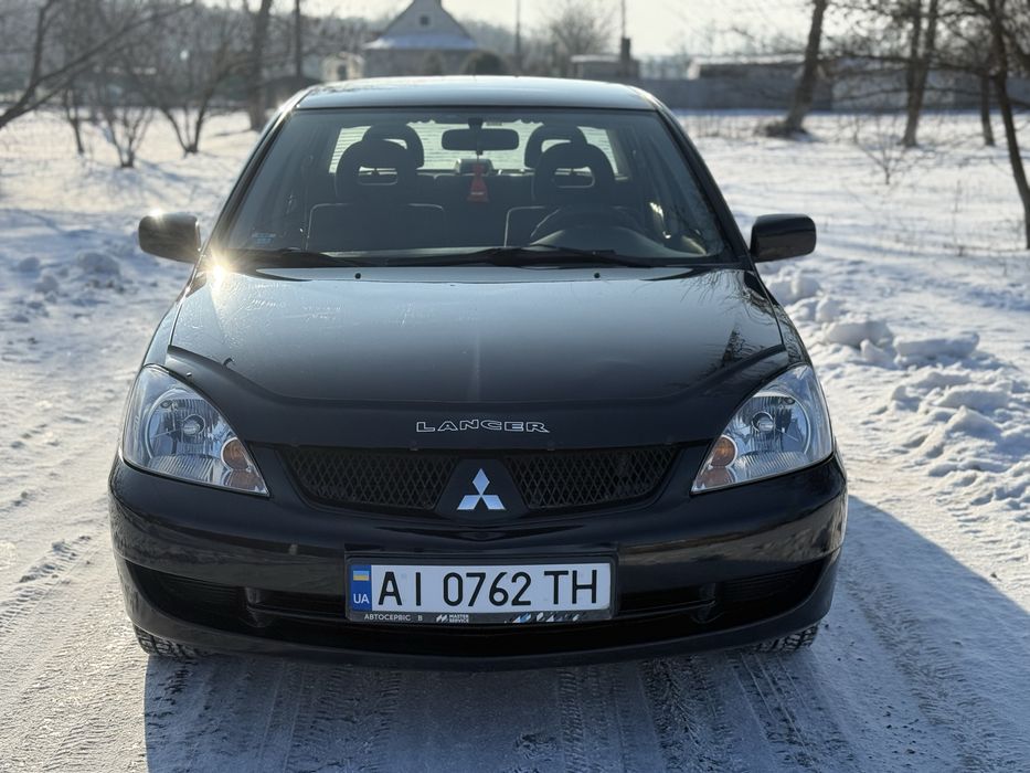 Продам  Mitsubishi Lancer