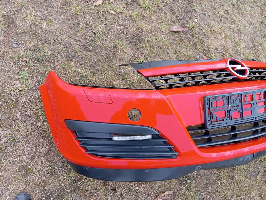 OPEL ASTRA H III Zderzak przód kompletny Grill Oryginał Y547