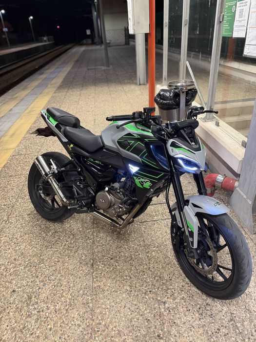 KL duel 125cc com escape feito a mao