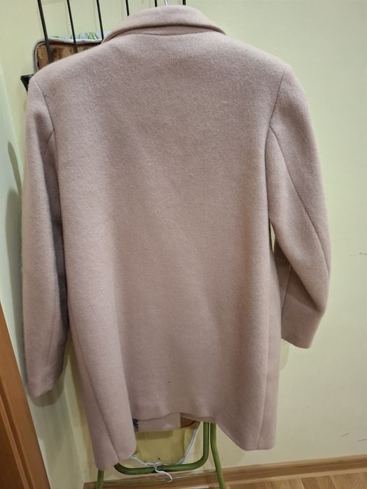 Пудрово-рожеве пальто