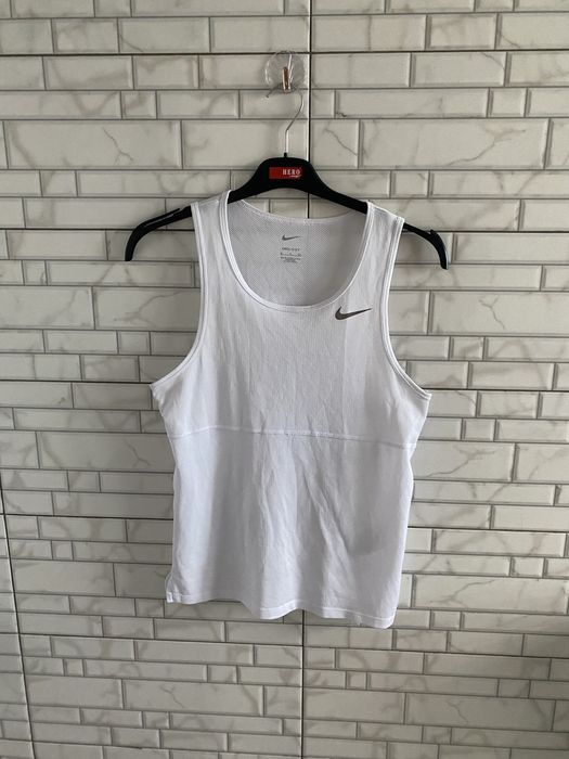 Жіночі спортивні футболки,майки  Nike,Puma,Adidas,Reebok