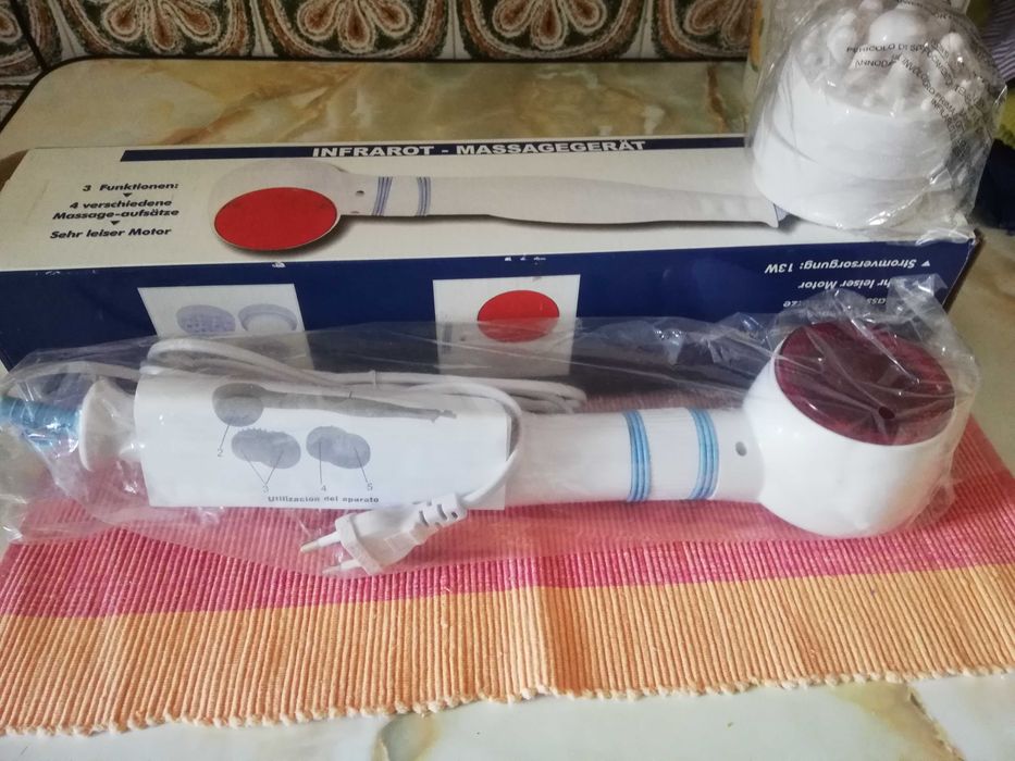 Massajador com infravermelhos. Por estrear, ainda embalado - 25 euros.