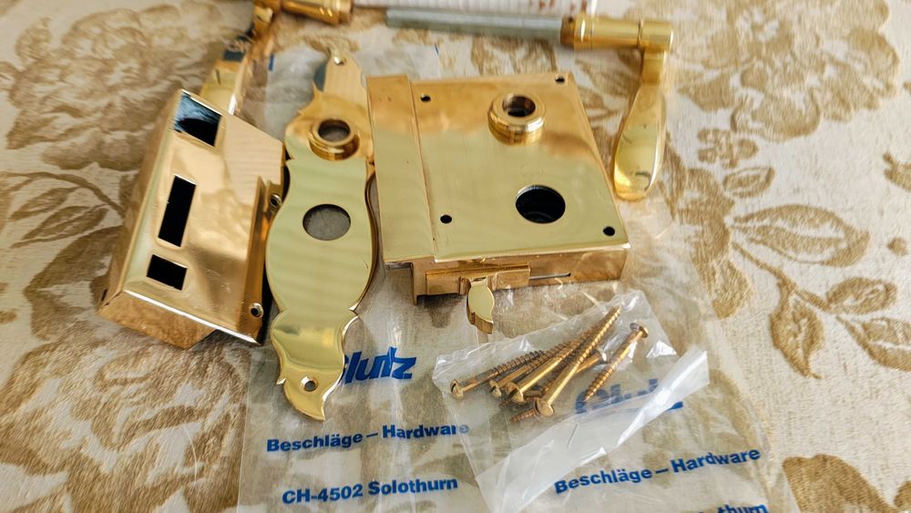 Zamek drzwi lub furtki Glutz mosiądz mosiężny połysk