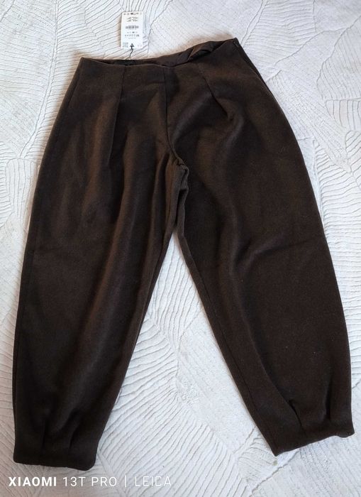 Spodnie wełniane od Zara, M