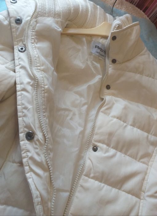 Женский пуховик .