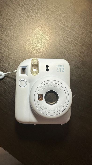 Instax Mini 12 + bolsa original – Como nova