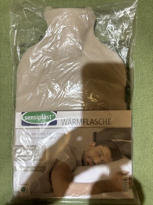 Гумова грілка  в плюшевому чохлі.