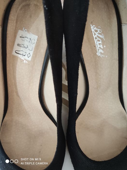 Buty na słupku Błażej