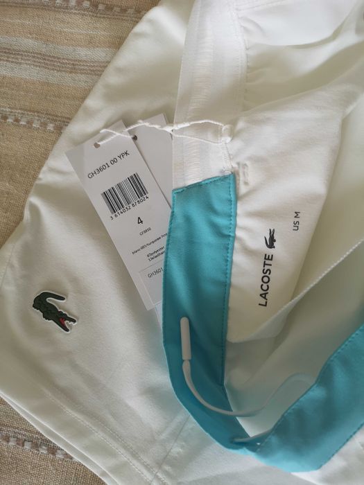 Lacoste Roland Garros Paris, nowe spodenki Tenis roz.M jak Nike