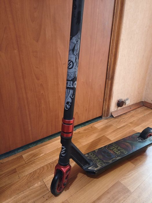 Трюковий самокат Oxelo Scooters MF 1.8 у хорошому стані