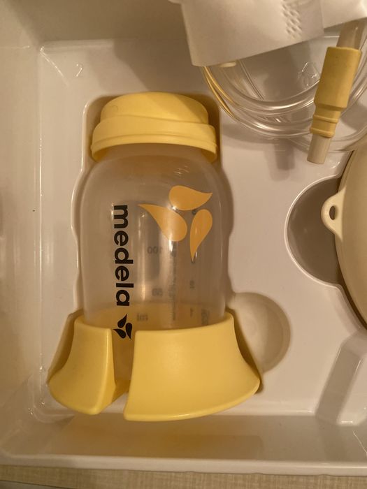 Електронный молокоотсос medela