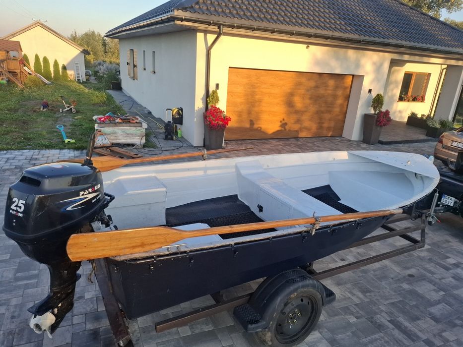 Romana 430 + silnik parsun 25 + przyczepa.