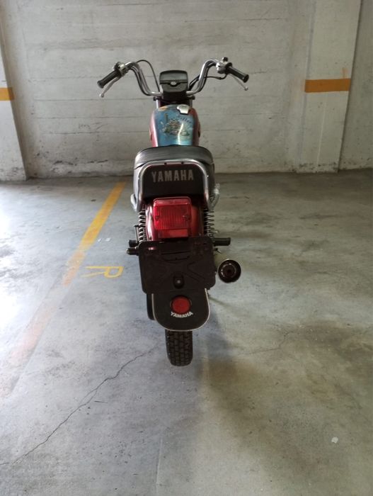 Moto  com documentos
