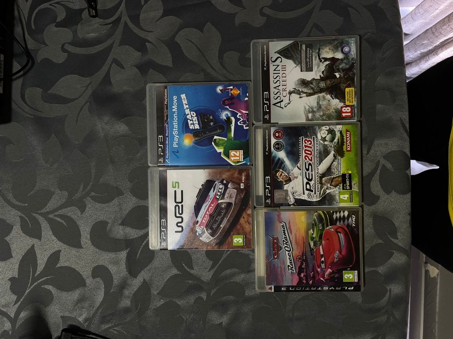 Pack PlayStation 3 Super Slim + 5 Jogos + 2 Comandos + Kit PlayStation Move (4 Comandos Move + Câmera Eye)