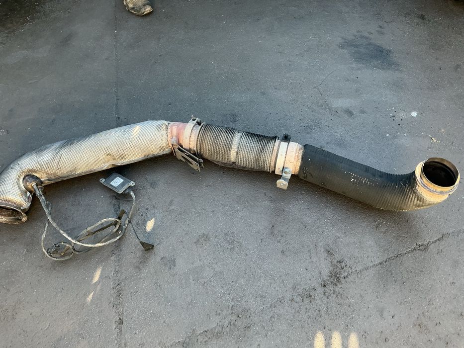 LINHA DE ESCAPE CALATIZADOR CAMIAO MAN TGX ANO 2007/2025