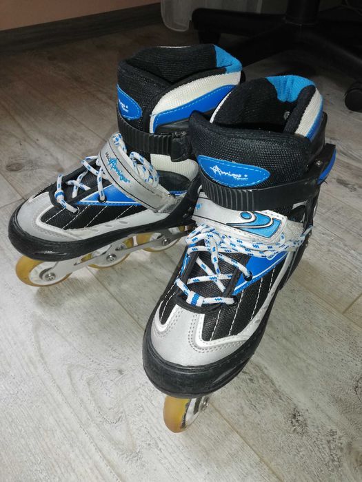 Роликовые коньки