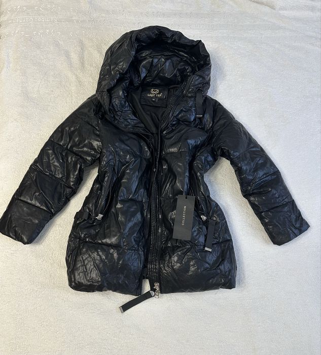 Нова курточка з біркою