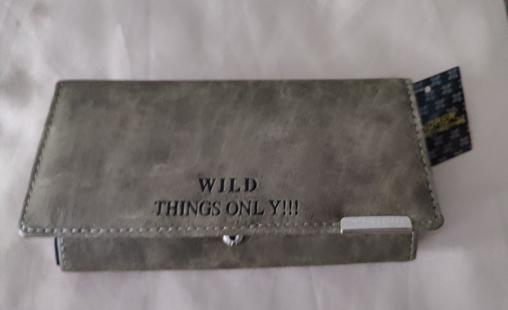 Nowy dłuższy portfel z metką