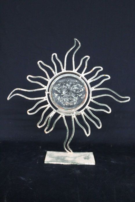 Castiçais em ferro e vidro