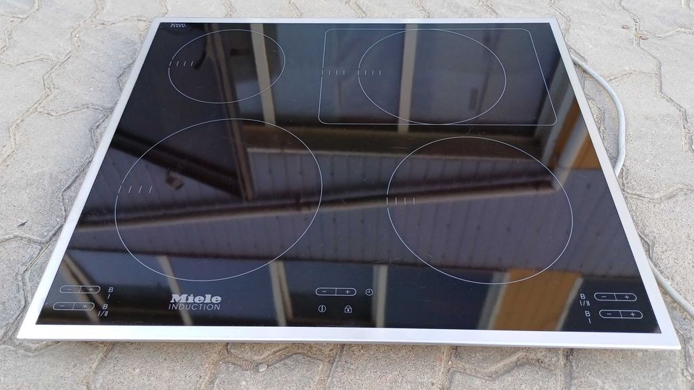Вбудована варильна поверхня індукційна 60 см Міле Miele KM 6115 бустер б/в встраиваемая индукционная поверхность плита Миле б/у
