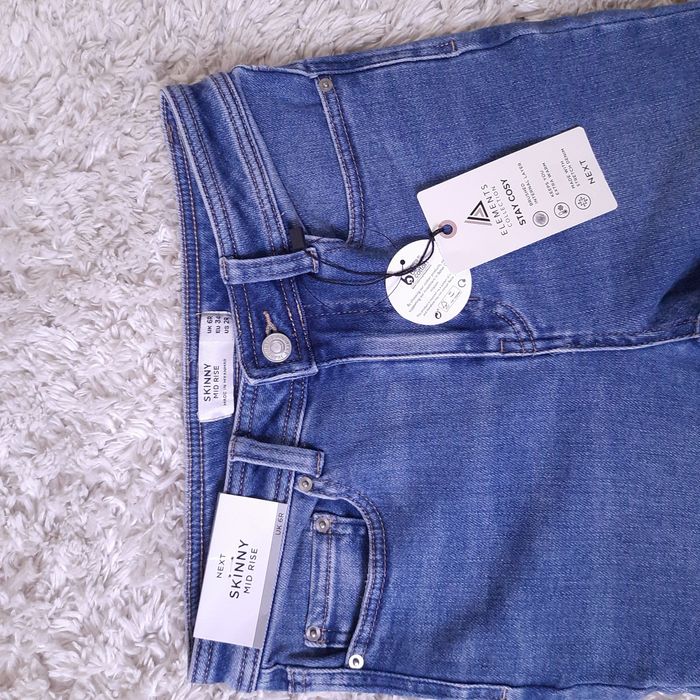 Jeansy ocieplane NEXT r.34 nowe