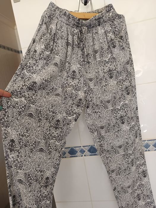 Calças com padrão renda