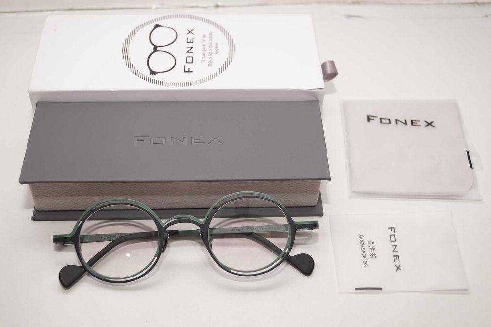 1687 Kolorowe okulary tytanowe oprawki okrągłe do komputera zerówki