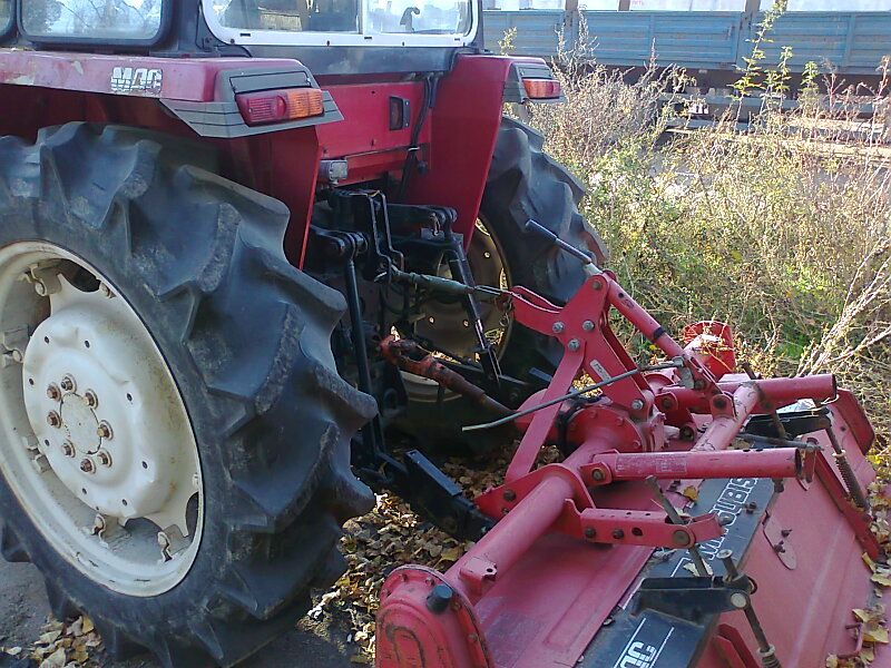 Вспашка земли минитрактором