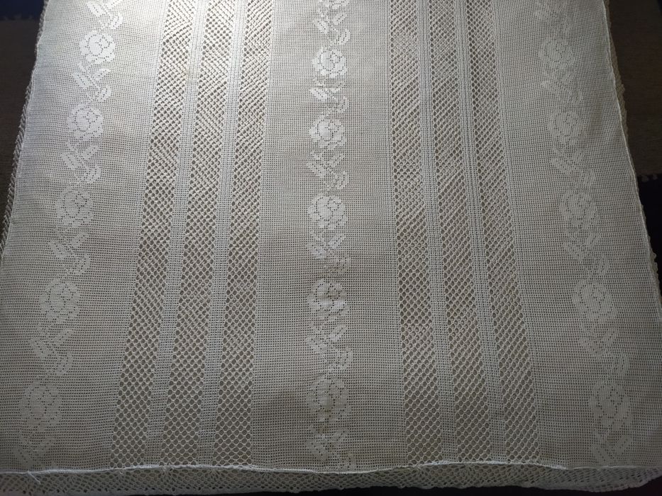 Colcha de renda com oferta panos