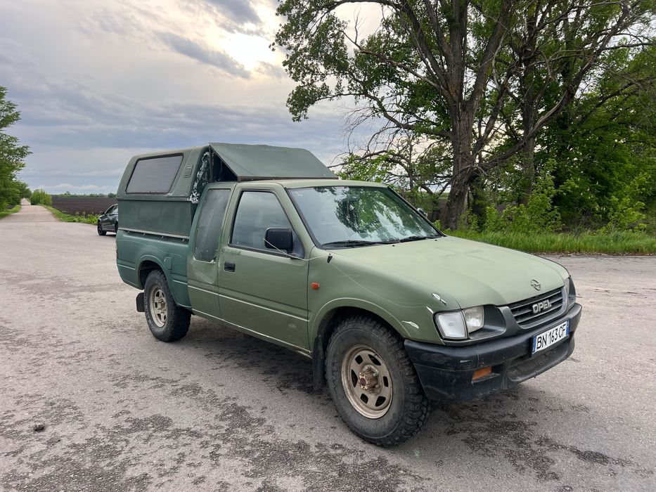Opel Campo 4 • 4