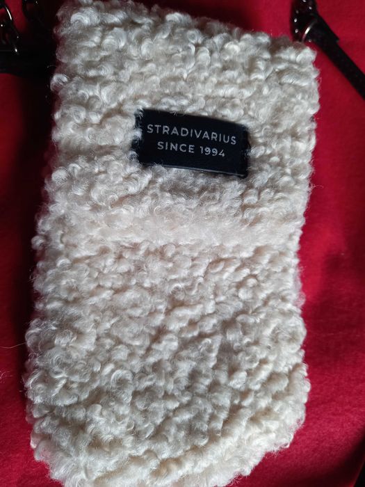Bolsa para telemóvel em pêlo artificial creme - Stradivarius