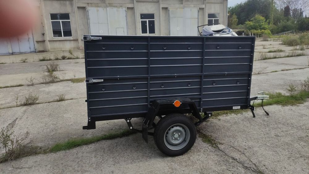 Причіп спеціалізований ПА 23 на ресорах Волга з двома бортами