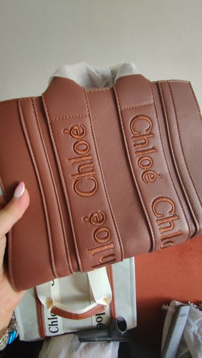 Mała nowa  torebka z napisem Chl