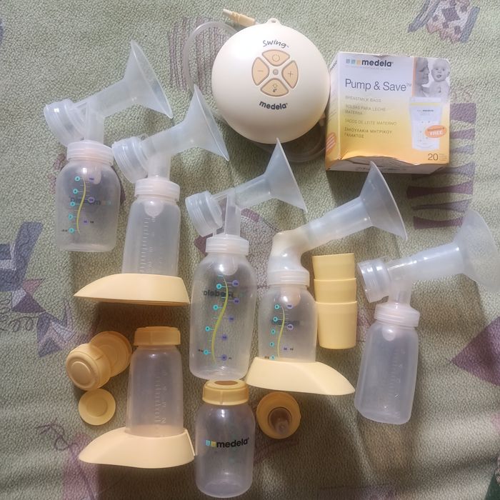 Молокоотсос Medela Swing б/у
