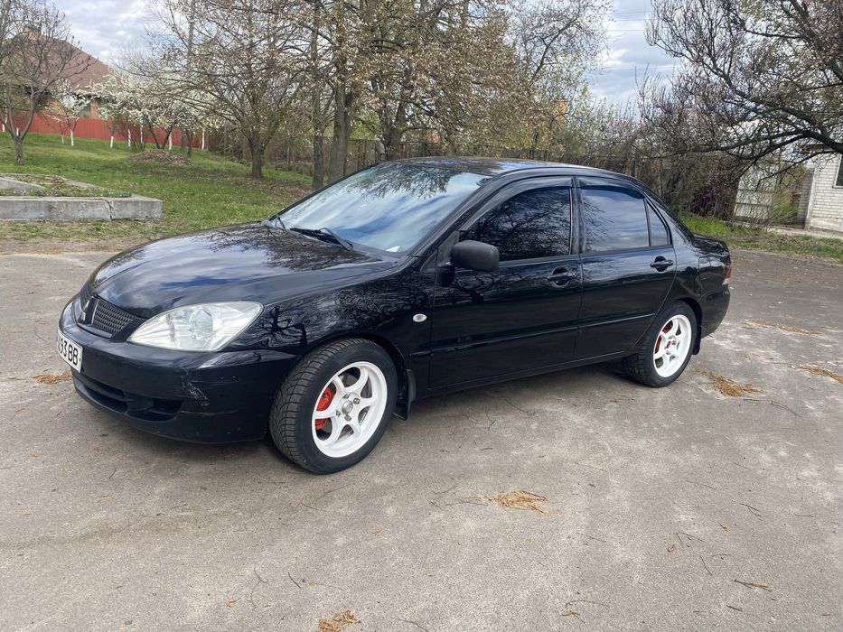 Mitsubishi Lanser 1,6 gaz