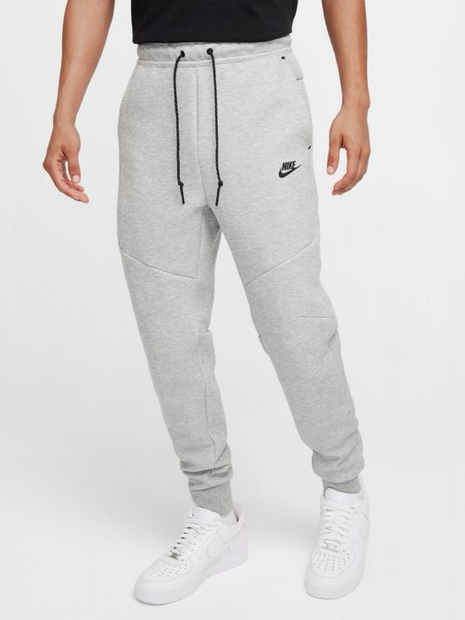 Calças nike tech cinzentas