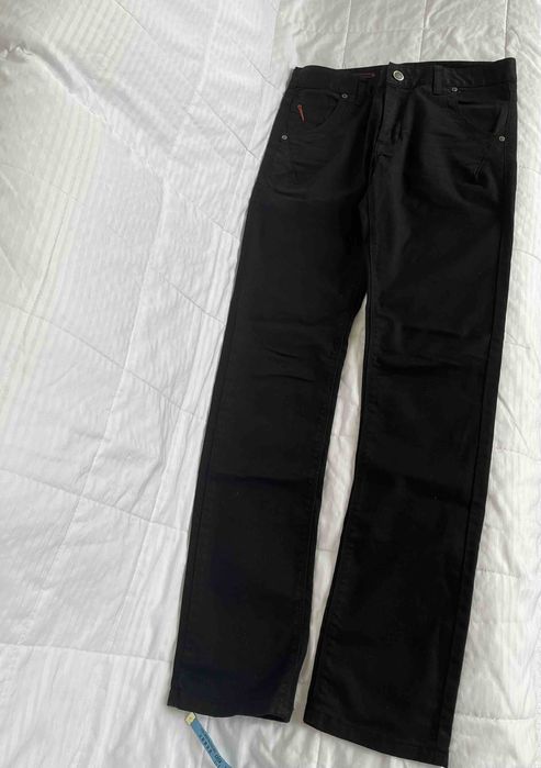 Дизайнерські чоловічі джинси